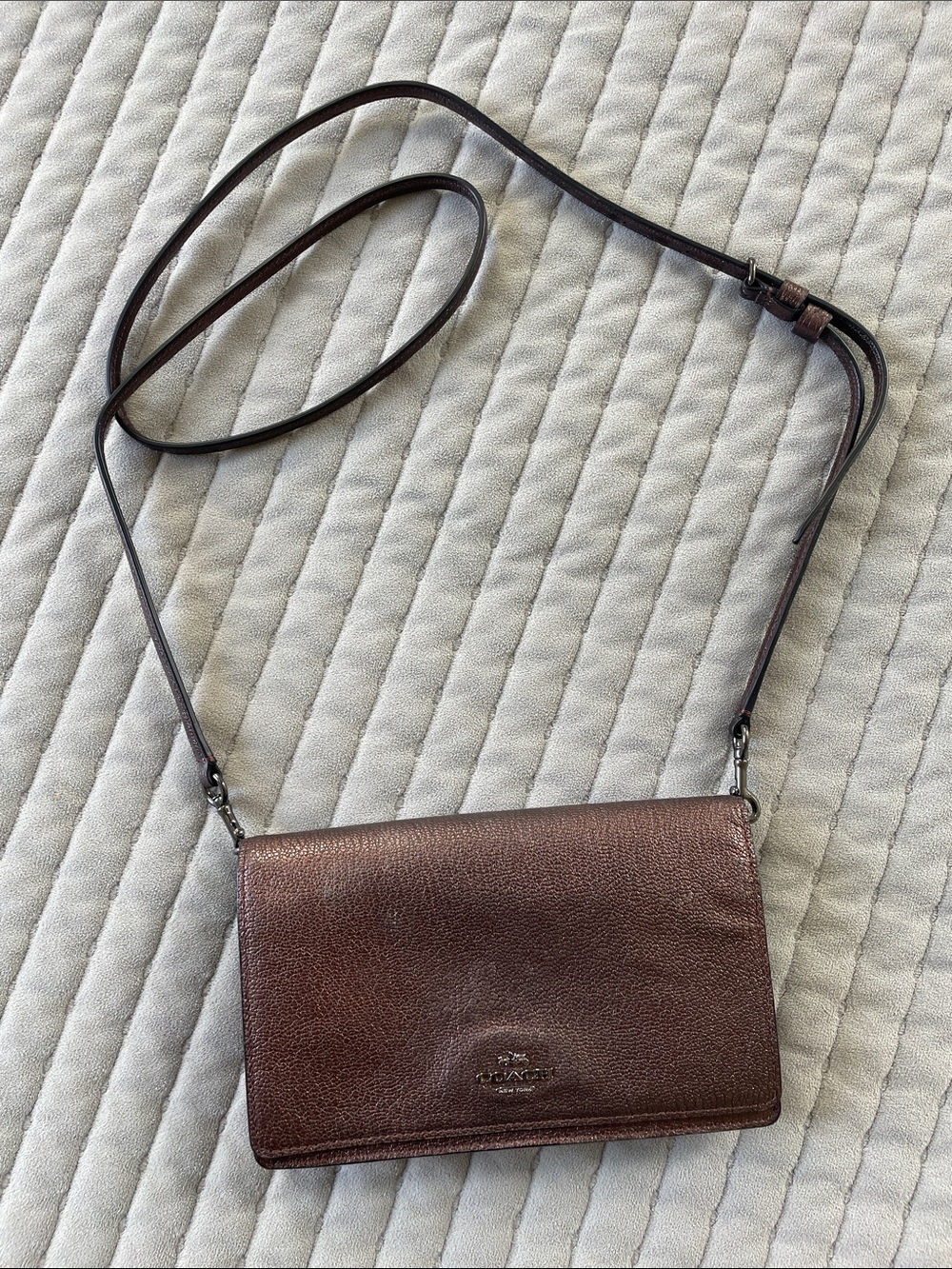 Coach Hayden fold over Crossbody Clutch in metallic bronze, polished pebble